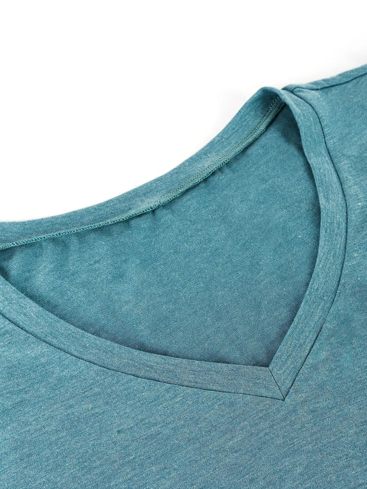 Kizzy - Camiseta Transpirable Con Mangas Tipo Pétalo