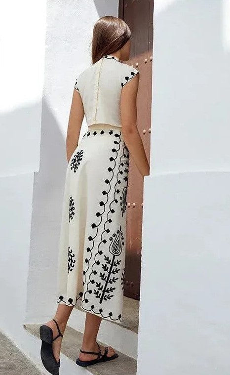 Charitini - Elegante Conjunto De Top Sin Mangas Y Falda Fluida