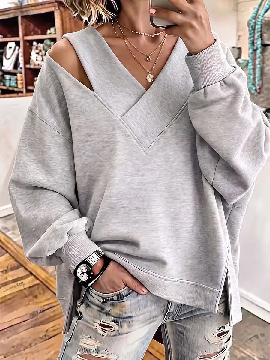 Kirstan - Sudadera Oversize Con Cuello en V y Aberturas Elegantes