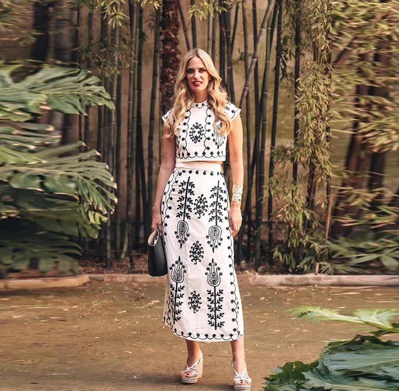 Charitini - Elegante Conjunto De Top Sin Mangas Y Falda Fluida