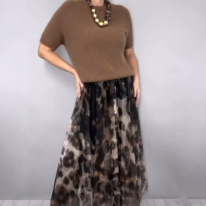 Orli - Elegante jersey y falda floral con estampado de leopardo