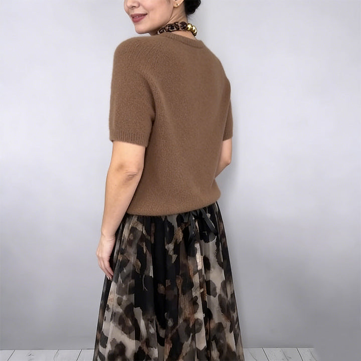 Orli - Elegante jersey y falda floral con estampado de leopardo